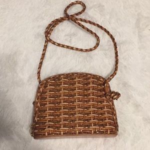 Super cute braided leather bag with leather bottom. Made a n Brazil.